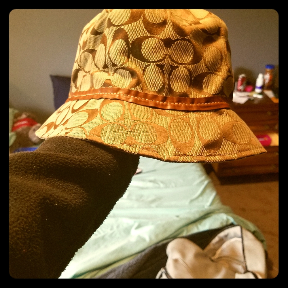 Coach bucket hat size small.